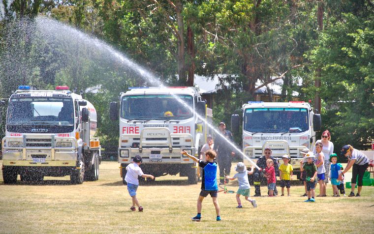 Kids enjoying the spray